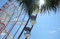 Beautiful Ferris wheel against blue sky on sunny day, low angle view Royalty Free Stock Photo