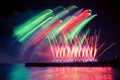 Beautiful, festive, colorful fireworks over the water with reflection Royalty Free Stock Photo