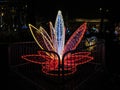 Beautiful festive magic sculpture in the form of a red lily flower at the Festival of Illuminations NeoYear 2018 on Sofia in Kiev