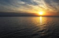 Beautiful fiery sunset sky on the beach. Composition of nature