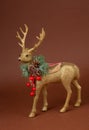 Beautiful figurine of Christmas golden Scandinavian deer Royalty Free Stock Photo