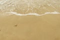 Beautiful fine beach sand with the little wave Royalty Free Stock Photo