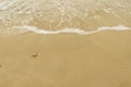 Beautiful fine beach sand with the little wave