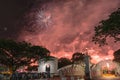 Firework display with people celebrating New Year in downtown Singapore Royalty Free Stock Photo