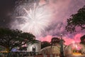 Firework display with people celebrating New Year in downtown Singapore Royalty Free Stock Photo