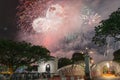 Firework display with people celebrating New Year in downtown Singapore Royalty Free Stock Photo