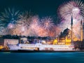 Beautiful fireworks above public ferry and old district of Istanbul Royalty Free Stock Photo