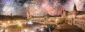 Beautiful fireworks above Spain Square on sunset, Seville Royalty Free Stock Photo