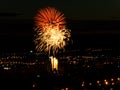 Beautiful fireworks on the background of the city at night in the holiday for the new year.