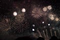 Multiple Fireworks in night sky in a composition in shades gold Royalty Free Stock Photo