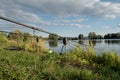 Beautiful fish pond in Badin, near Banska Bystrica, Slovakia. Sky reflection in the water. Fishing place. Shining sun over the Royalty Free Stock Photo