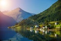 Beautiful fishing houses on fjord. Beautiful nature with blue sky, reflection in water and fishing house. Norway Royalty Free Stock Photo