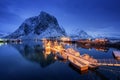 Beautiful fishing village with boats at night, Lofoten islands Royalty Free Stock Photo