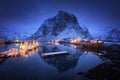 Beautiful fishing village with boats at night, Lofoten islands Royalty Free Stock Photo