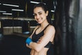 Beautiful and fit female fighter getting prepared for the fight or training Royalty Free Stock Photo