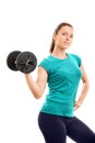 Beautiful fit girl smiling and holding a dumbbell Royalty Free Stock Photo