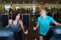 Beautiful fit senior couple in gym doing cardio work out. Royalty Free Stock Photo