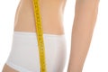 Beautiful fit slim woman body measuring hips Royalty Free Stock Photo