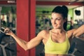 Beautiful fit woman working out in gym - girl in fitness Royalty Free Stock Photo