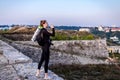 A tourist girl drinks water in bright sunlight Royalty Free Stock Photo