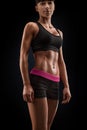 Beautiful fitness female slim tanned body