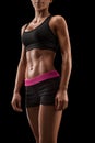 Beautiful fitness female slim tanned body