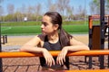 Beautiful fitness girl doing exercises in stylish sportswear  outdoors. Royalty Free Stock Photo