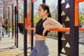 Beautiful fitness girl doing exercises in stylish sportswear  outdoors. Royalty Free Stock Photo