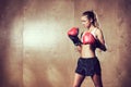 Beautiful Fitness Woman Boxing with Red Gloves Royalty Free Stock Photo