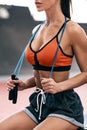 Beautiful fitness woman with skipping rope, workout. athletic girl, sports concept