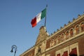 Beautiful flag of Mexico waving from above Palacio de Gobierno or National Palace, Mexico DF, Mexico