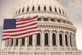 Beautiful flag of the United States of America waving with the strong wind and behind it the dome of the Capitol USA 3D RENDER, 3D