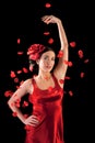 Beautiful flamenco girl with rose petals Royalty Free Stock Photo