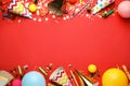 Beautiful flat lay composition with festive items on red background, space for text. Surprise party concept Royalty Free Stock Photo