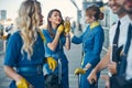 Charming stewardesses and pilots standing on the street Royalty Free Stock Photo