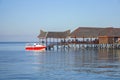 Beautiful floating chalet at mabul island aand blue sky