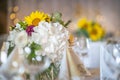 Beautiful floral arrangement or decoration for wedding or event. Sunflower Wedding Table centepiece/ summer colors. Royalty Free Stock Photo