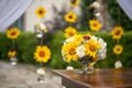 Beautiful floral arrangement or decoration for wedding or event. Sunflower Wedding Table centepiece/ summer colors. Royalty Free Stock Photo