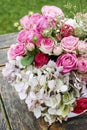 Beautiful floral arrangement with pink roses, hortensia and gypsophila paniculata Royalty Free Stock Photo