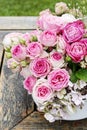 Beautiful floral arrangement with pink roses, hortensia and gypsophila paniculata Royalty Free Stock Photo