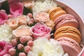 Beautiful floral background in the Box with the macaroons on top of the background