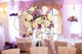 Beautiful floral centerpiece at wedding reception table closeup