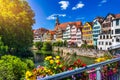 Beautiful floral colorful town Tubingen in Germany Baden-Wurttemberg. Houses at river Neckar and Hoelderlin tower, Tuebingen,