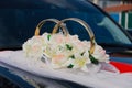 Beautiful floral decoration is on a wedding car. Royalty Free Stock Photo