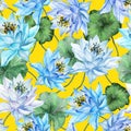 Beautiful floral seamless pattern. Large blue lotus flowers with green leaves on yellow background. Hand drawn illustration. Royalty Free Stock Photo