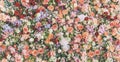 Beautiful floral wall background with fresh rose and flower bouquet pattern. Vintage wedding decoration banner Royalty Free Stock Photo