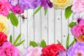 Beautiful flower blossom and leaf frame on white wood background