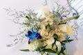 Beautiful flower bouquet centerpiece with blue and white Royalty Free Stock Photo