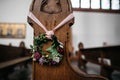 Beautiful flower crown placed inside a traditional church setting Royalty Free Stock Photo