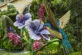 a beautiful flower garden with a hummingbird at Bellagio Conservatory and Botanical Gardens with colorful flowers Royalty Free Stock Photo